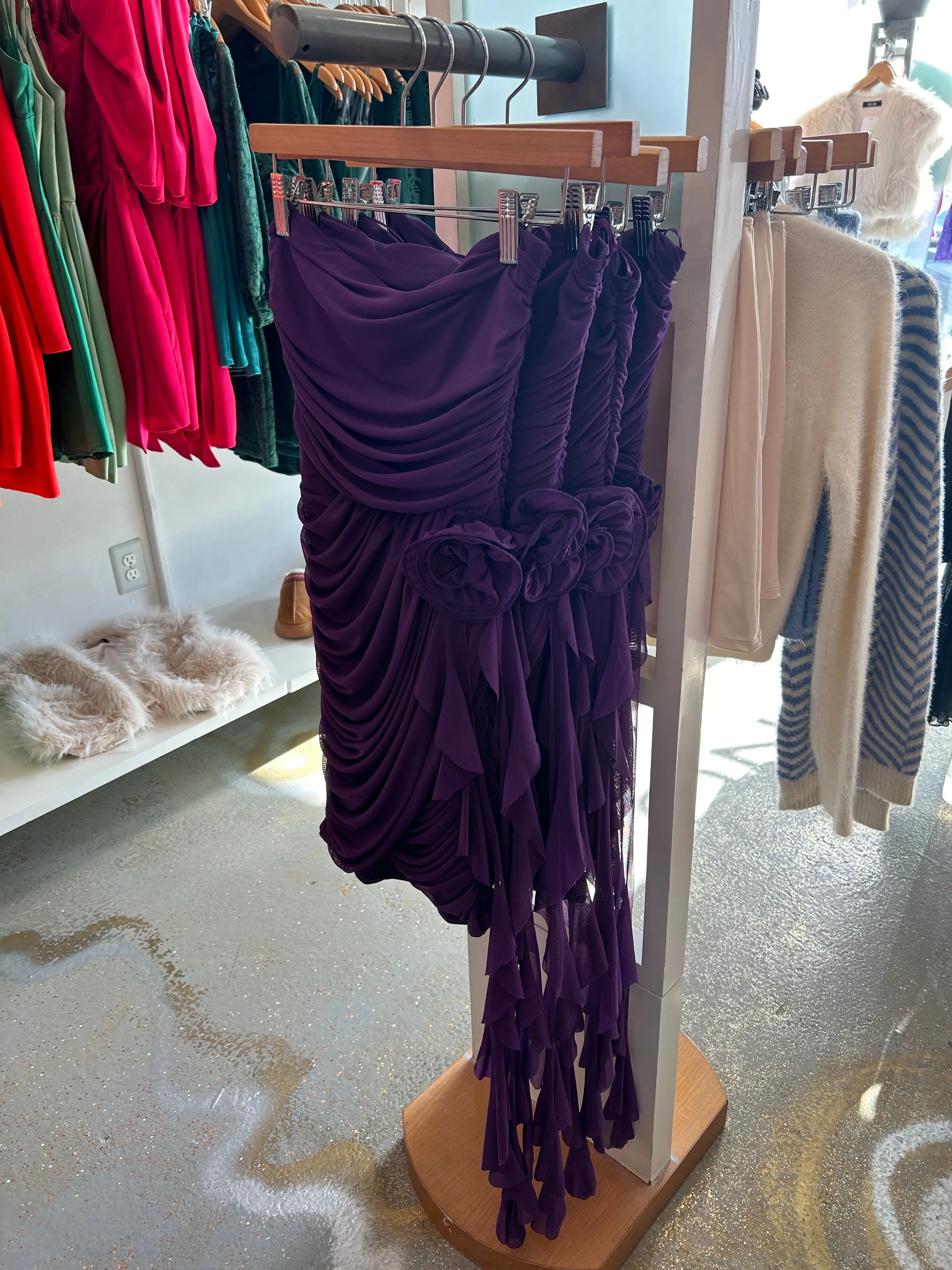 Purple strapless dress with mesh fabric.